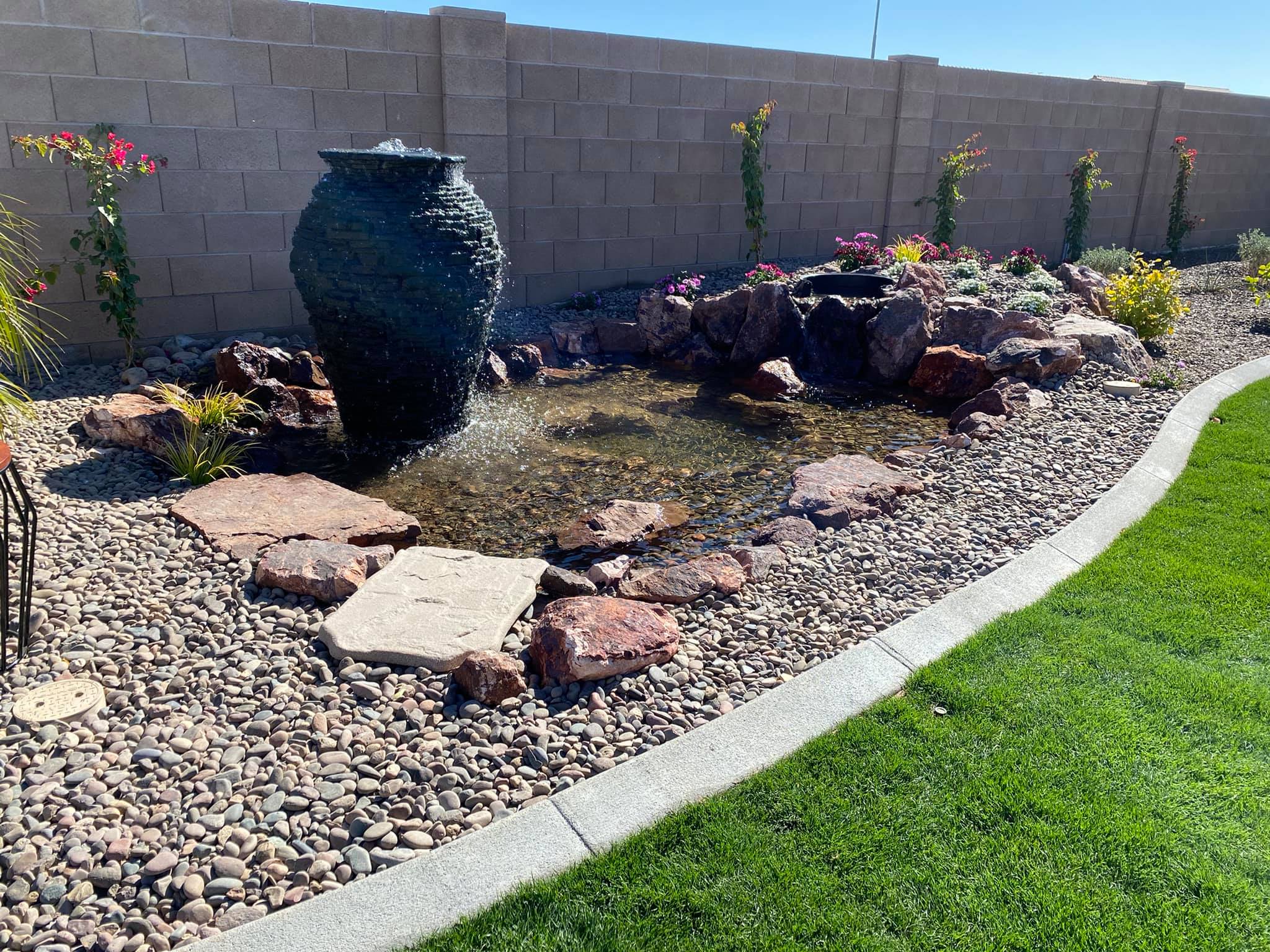 Concrete curbing along custom landscaping 