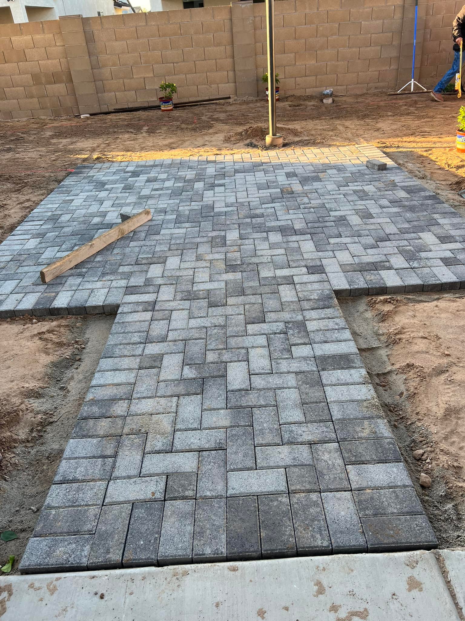 Pavers being placed for patio