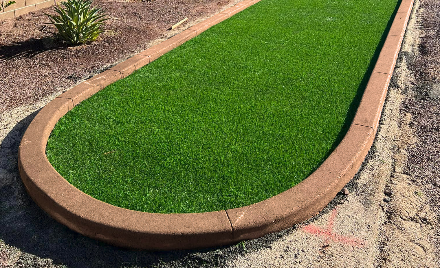 Colored concrete curbing 